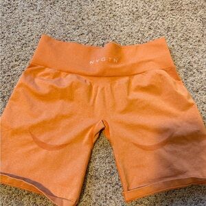 NVGTN Women's Vibrant Orange Bike Shorts